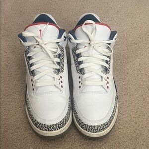 White cement 3 true blue           White and Blue Sneakers with Red Accents
